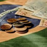 Como a Política e a Economia Afetam Seu Dinheiro na Bolsa de Valores